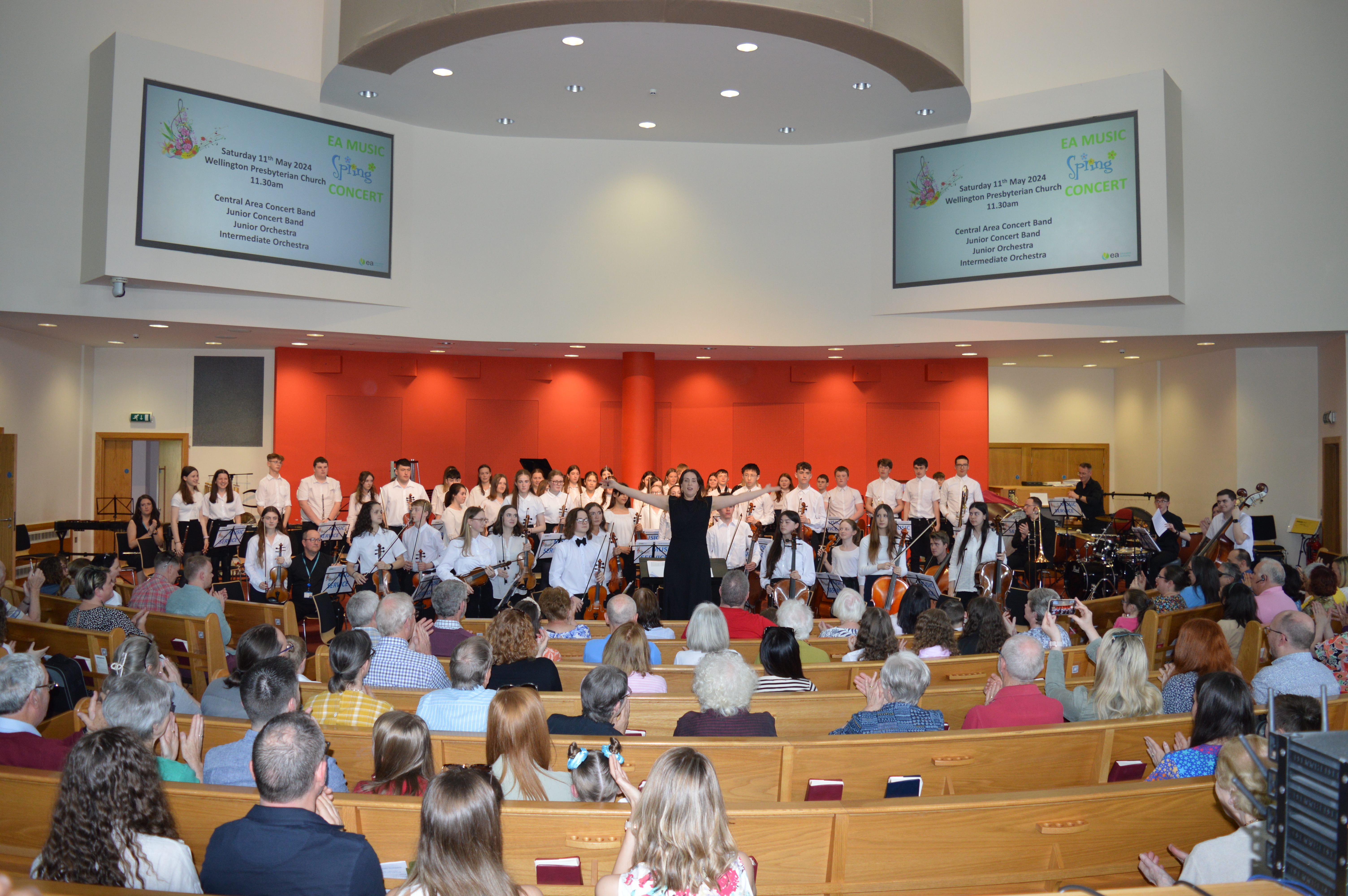 Young Orchestra musicians after their performance