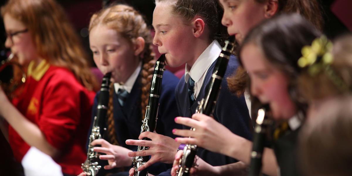 DIWB children playing musical instruments