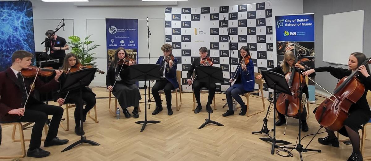 City of Belfast Youth Orchestra members performing for United Staes President Joe Biden at Ulster University