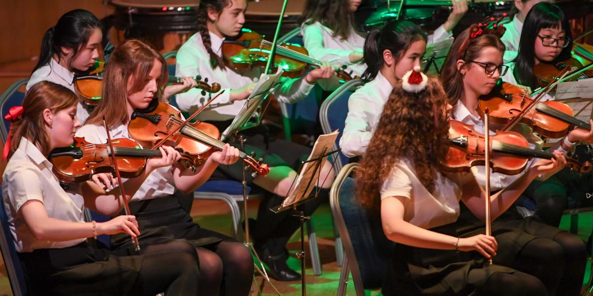 Young string players in Youth orchestra concert