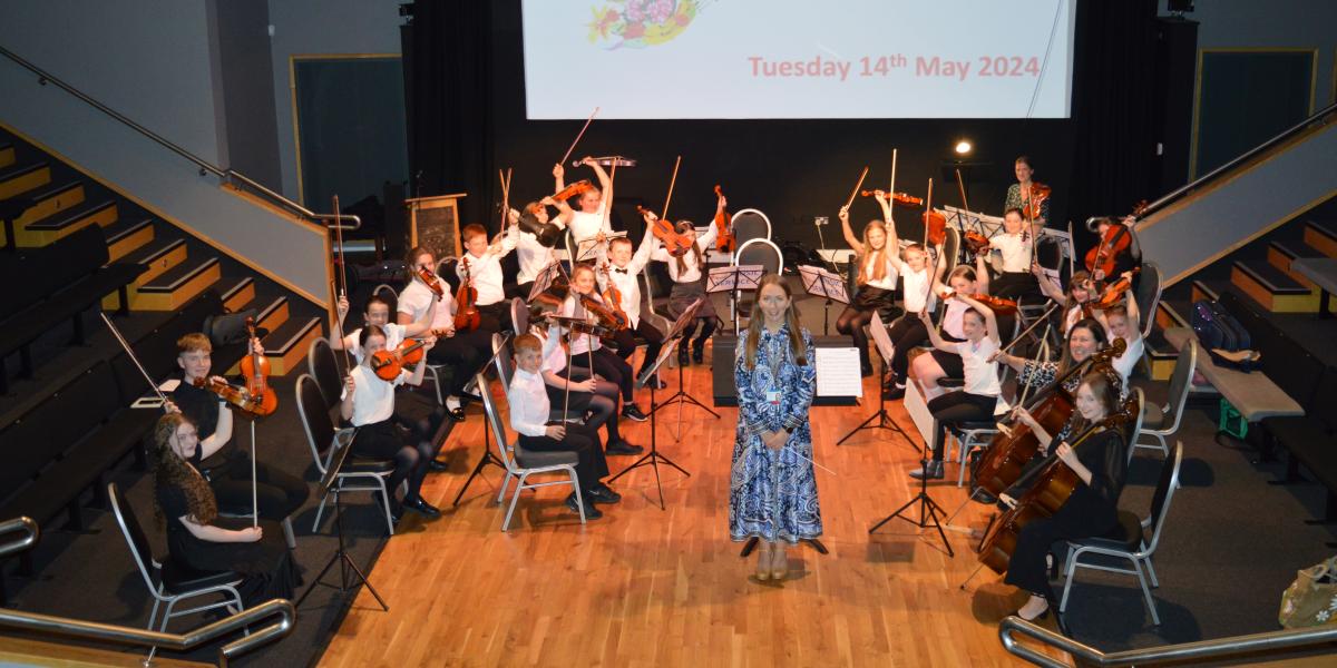 Young musicians performing in concert