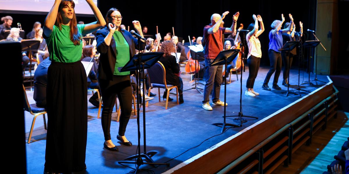 EA Music staff on stage during Springfest event