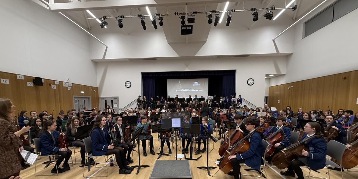 Pupils performing in an orchestra