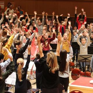 image of children participating at a music session