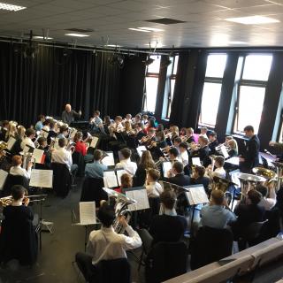 Steve Mead in rehearsal with brass students