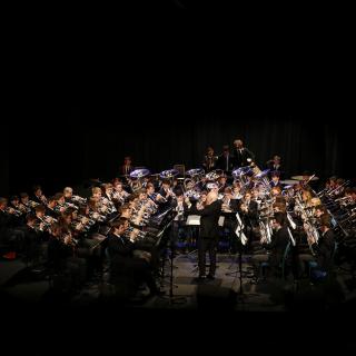 Steve Mead conducting pupils in concert
