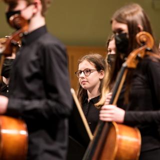 String players onstage in concert