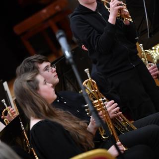 Trumpet soloist with trumpet section