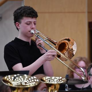 Trombone soloist with Brass section