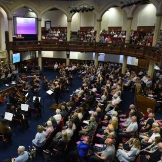 Audience and youth orchestra at assembly buildings conference centre