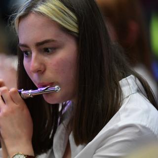 Piccolo player in orchestra