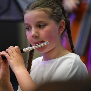 Piccolo player in orchestra