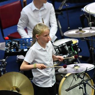 Cymbal player in concert