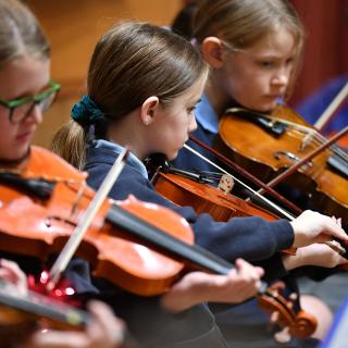 Junior string orchestra in concert