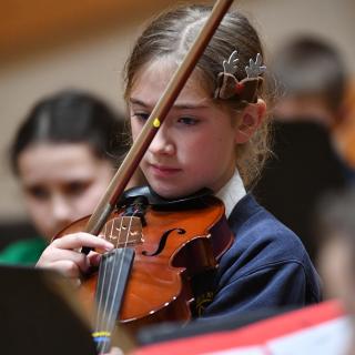 junior string orchestra in concert