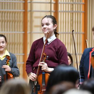 Violinists from Fermanagh Intermediate String Orchestra in concert