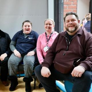 Arvalee staff and pupil enjoying staff roadshow performance