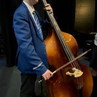 Double Bass player performing in Strule Theatre