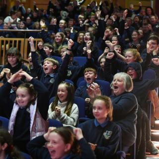 Primary school audience enjoying Springfest performance