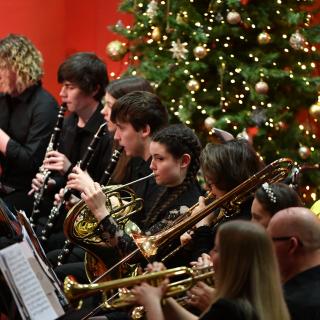 Young musicians performing in youth orchestra concert