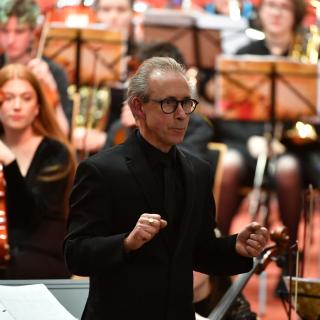 conductor at youth orchestra concert