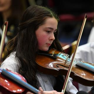 Young string players in Youth orchestra concert
