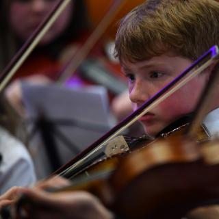 Young string players in Youth orchestra concert