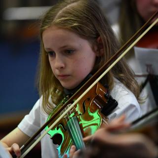 Young string players in Youth orchestra concert
