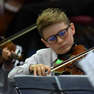 Young string players in Youth orchestra concert