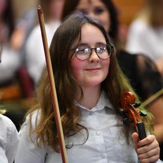 Young string players in Youth orchestra concert