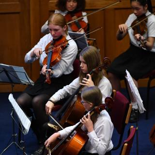 Young string players in Youth orchestra concert