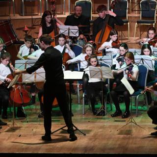Young string players in Youth orchestra concert