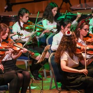 Young string players in Youth orchestra concert