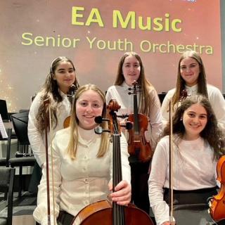 Young string players in Youth orchestra concert