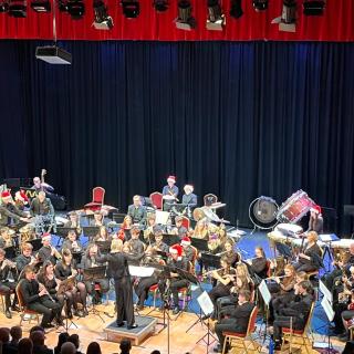 Young musicians performing in youth orchestra concert