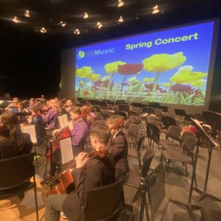 Young musicians performing in concert