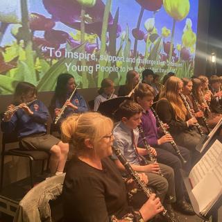 Young musicians performing in concert