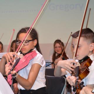 Young musicians performing in concert