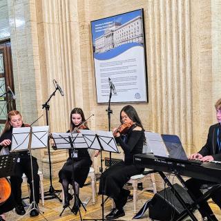 City of Belfast Youth orchestra members playing at Stormont
