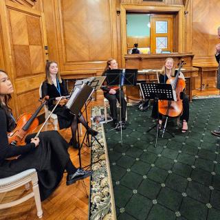 Young musicians in conversation with Ulster University Chancellor Dr Colin Davidson