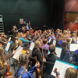 Young musicians performing in concert