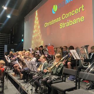 Young musicians performing in concert