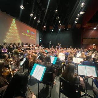 Young musicians performing in concert