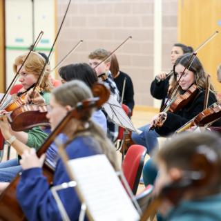 Children and young people playing string instruments at the Benedetti Foundation Sessions
