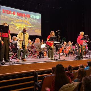 EA Music's Musical Pathways to Learning team on stage during Springfest