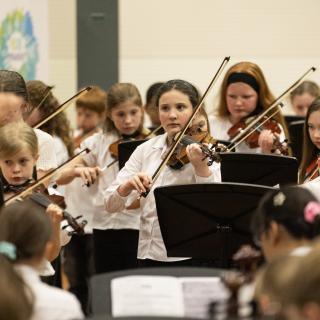 Young musicians performing in a concert