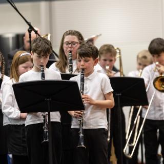 Young musicians performing in a concert