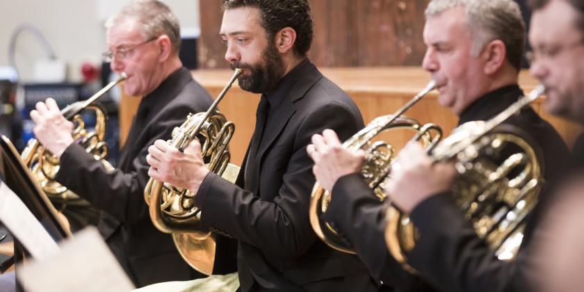 musicians playing French Horn