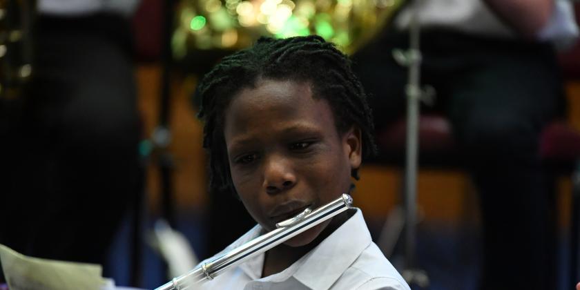 flautist performing in concert