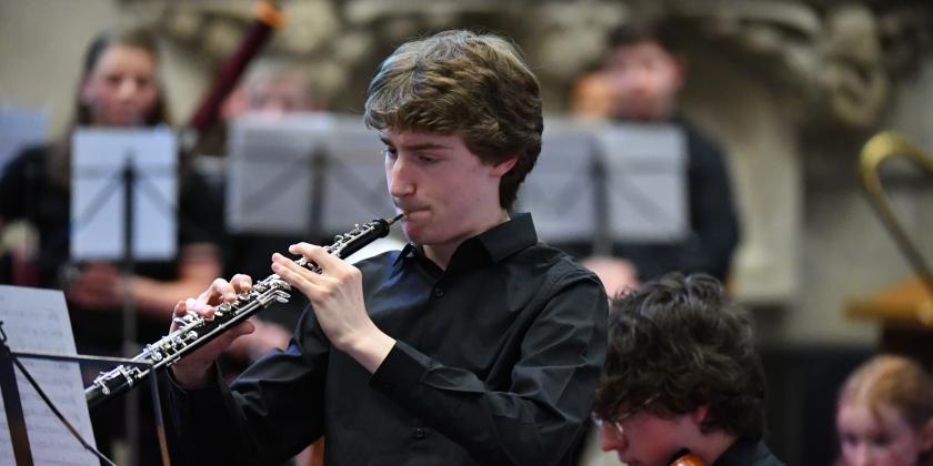 oboist performing in concert